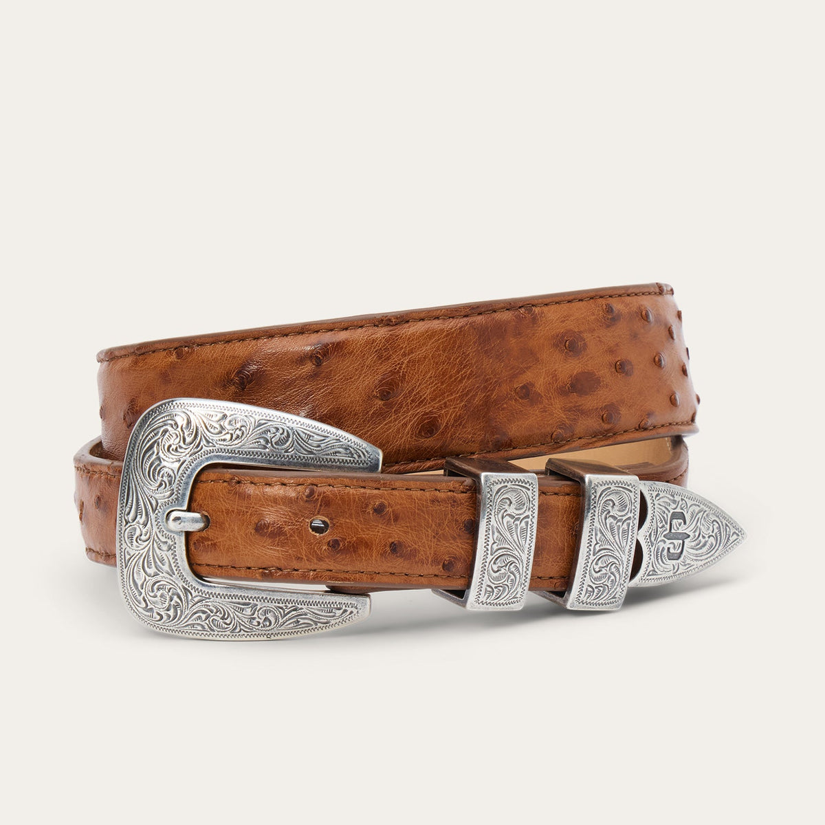 Stetson women's ostrich leather tapered tab belt in antique cognac with buckle detail, from Gem Dandy.