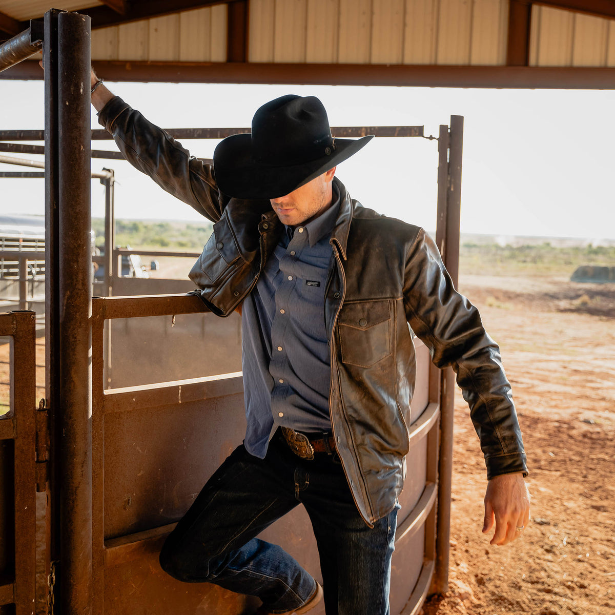 Distressed antique bronze leather Rancher jacket by STS Ranchwear, featuring rugged Western style and detailed craftsmanship.