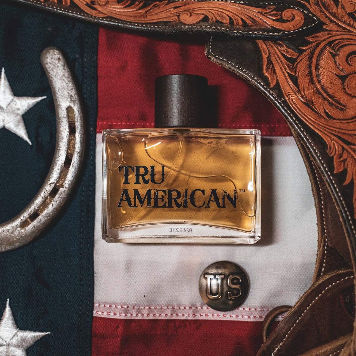 Tru American Cologne by Tru Fragrance & Beauty, a sleek glass bottle with a modern design, showcasing the cologne's stylish packaging.
