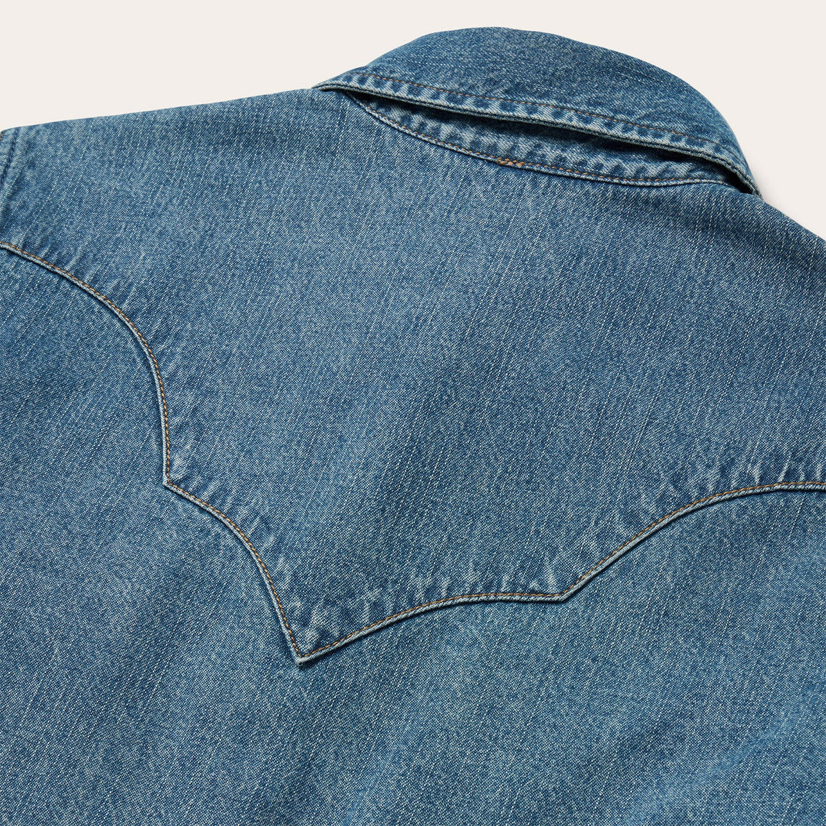 Stetson turquoise snap Western denim shirt with button closures and classic Western styling on a plain background.