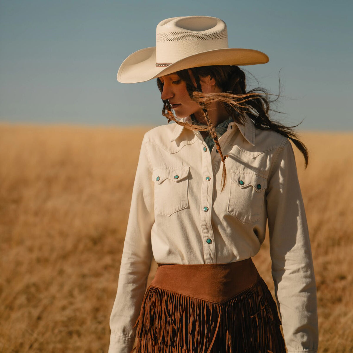 Stetson turquoise snap western denim shirt featuring a classic design, button front, and western-style collar.