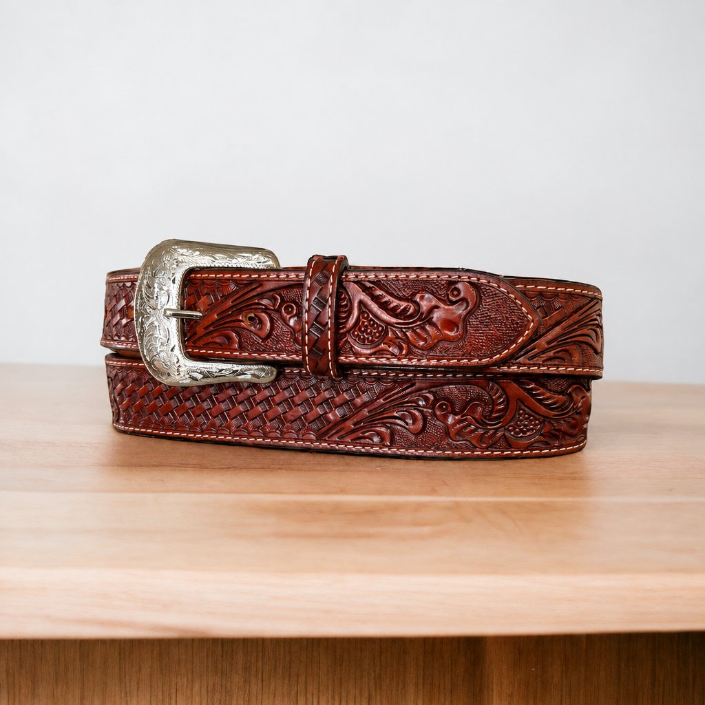 Twisted X men's reddish brown burgundy leather belt with deep floral tooling and an antique silver buckle