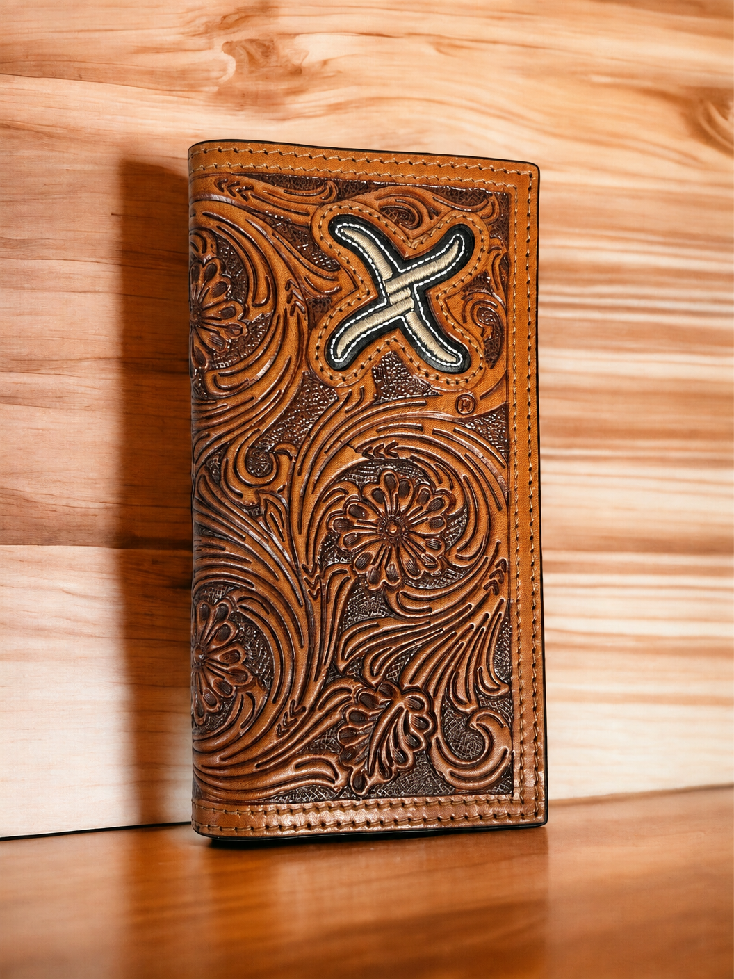 Twisted X tan floral tooled leather rodeo wallet with a silver X concho