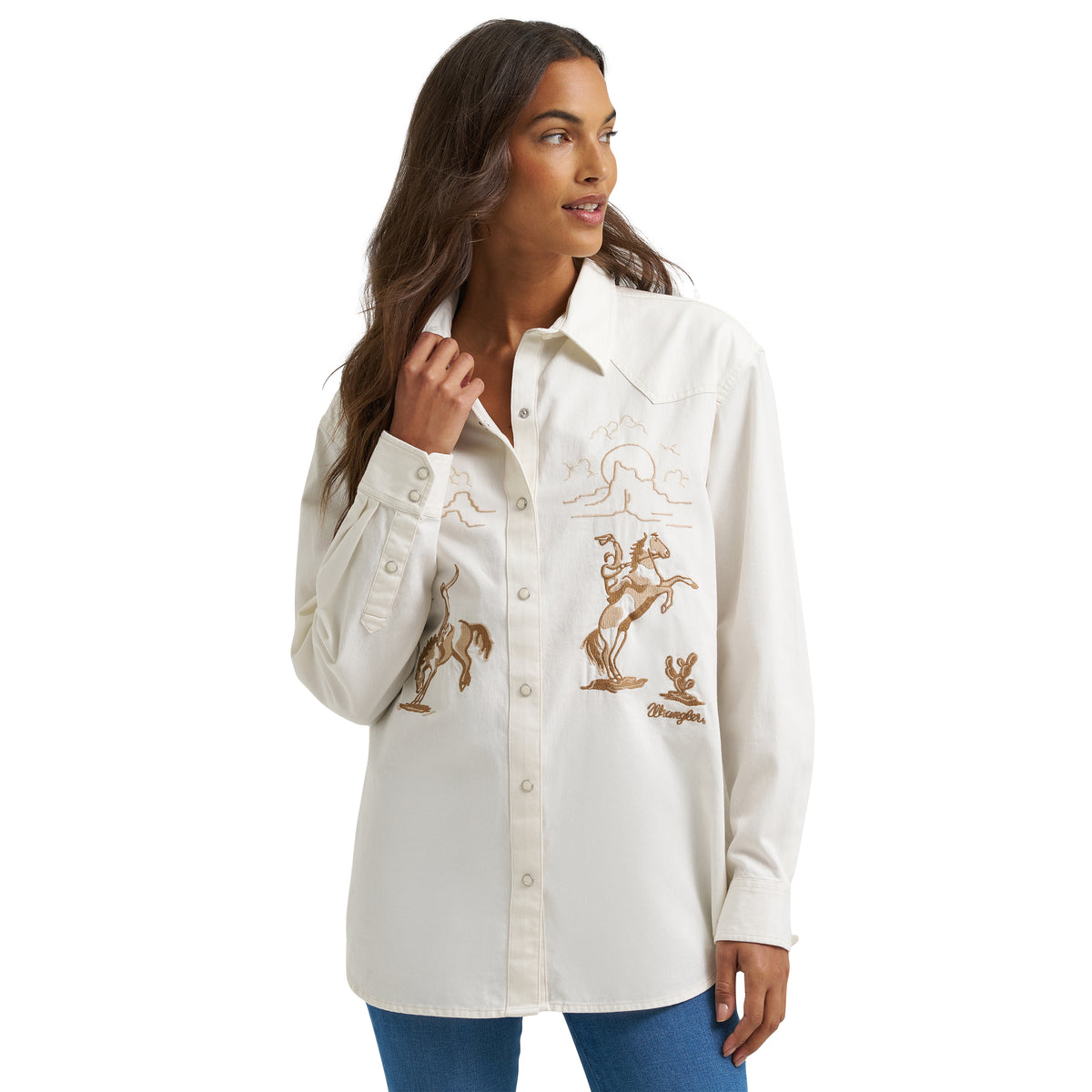 Women wearing Wrangler Retro vintage boyfriend denim snap shirt in cream, showcasing casual relaxed fit and classic button details.