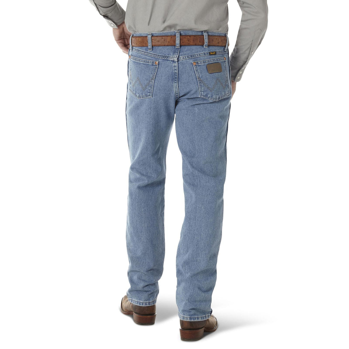 Wrangler Men's Cowboy Cut Original Fit jeans in antique wash, showcasing classic denim with a relaxed fit and traditional styling.