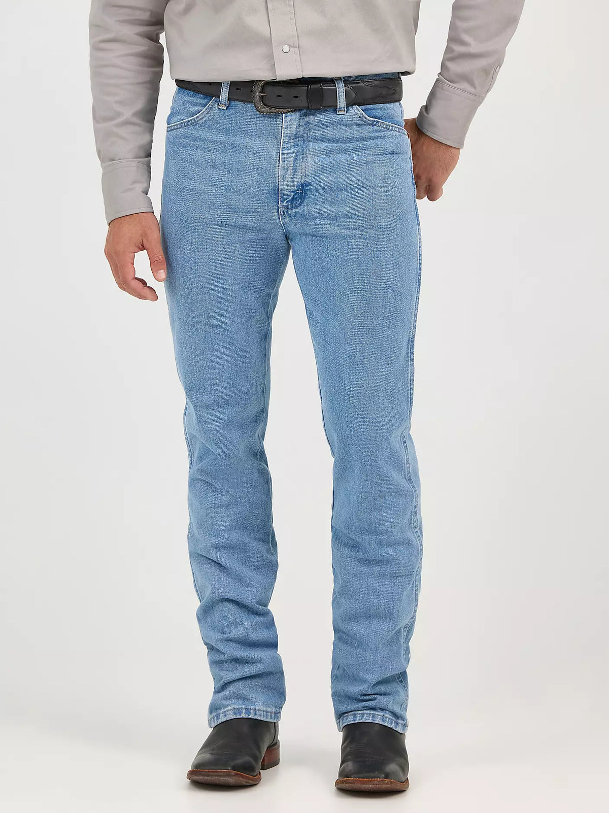Wrangler Men's Cowboy Cut Slim Fit jeans in antique wash with classic five-pocket design and contrast stitching.