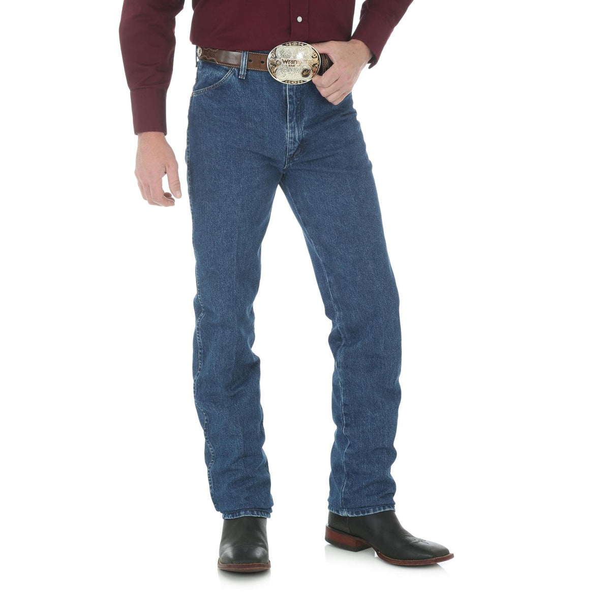 Wrangler Men's Cowboy Cut Slim Fit jeans in antique wash, shown in stonewashed denim with classic fit and durable stitching.
