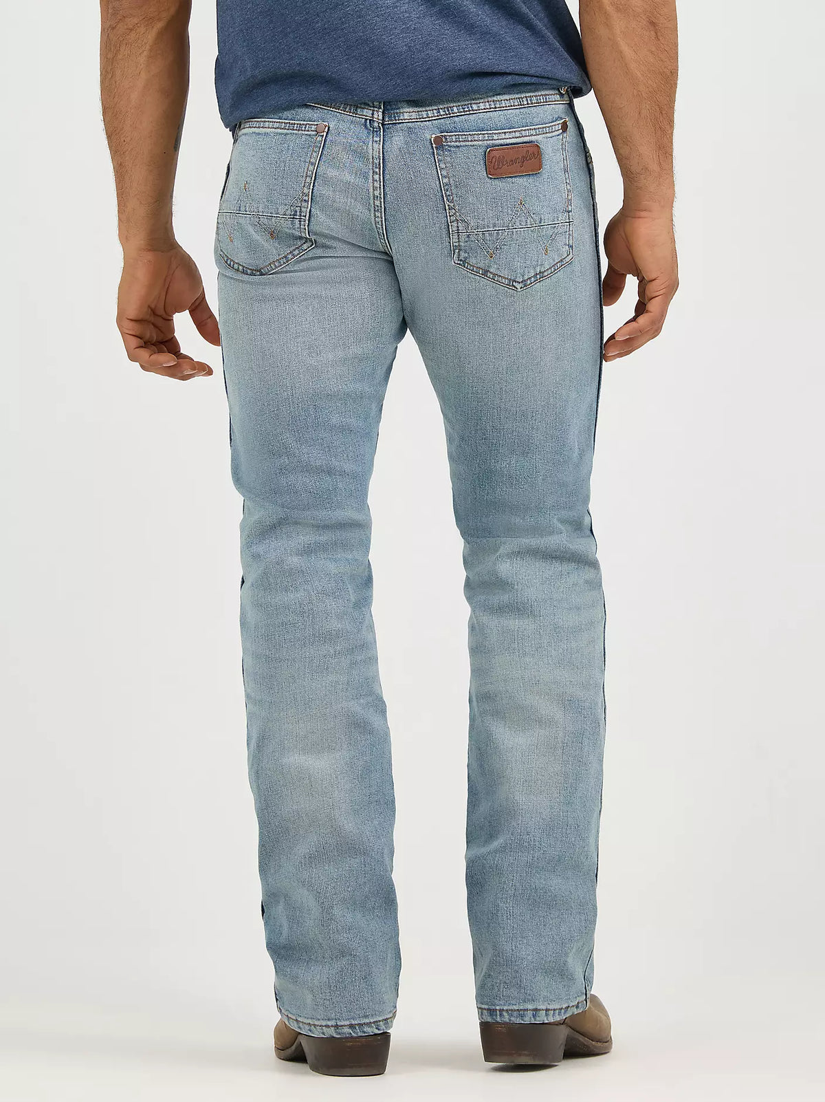 Wrangler Men's Retro Slim Boot Jeans in BR Wash showing classic denim fit with slim silhouette and boot cut design.