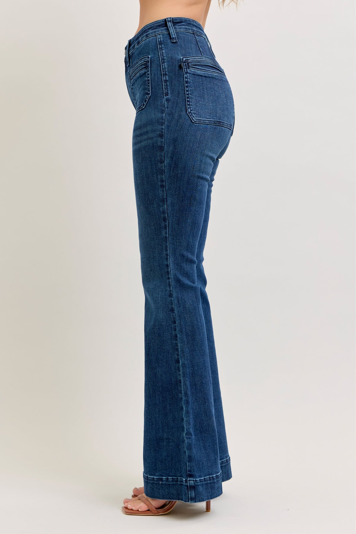 Judy Blue high waist pintuck flare jean in dark wash, hem and leg opening detail