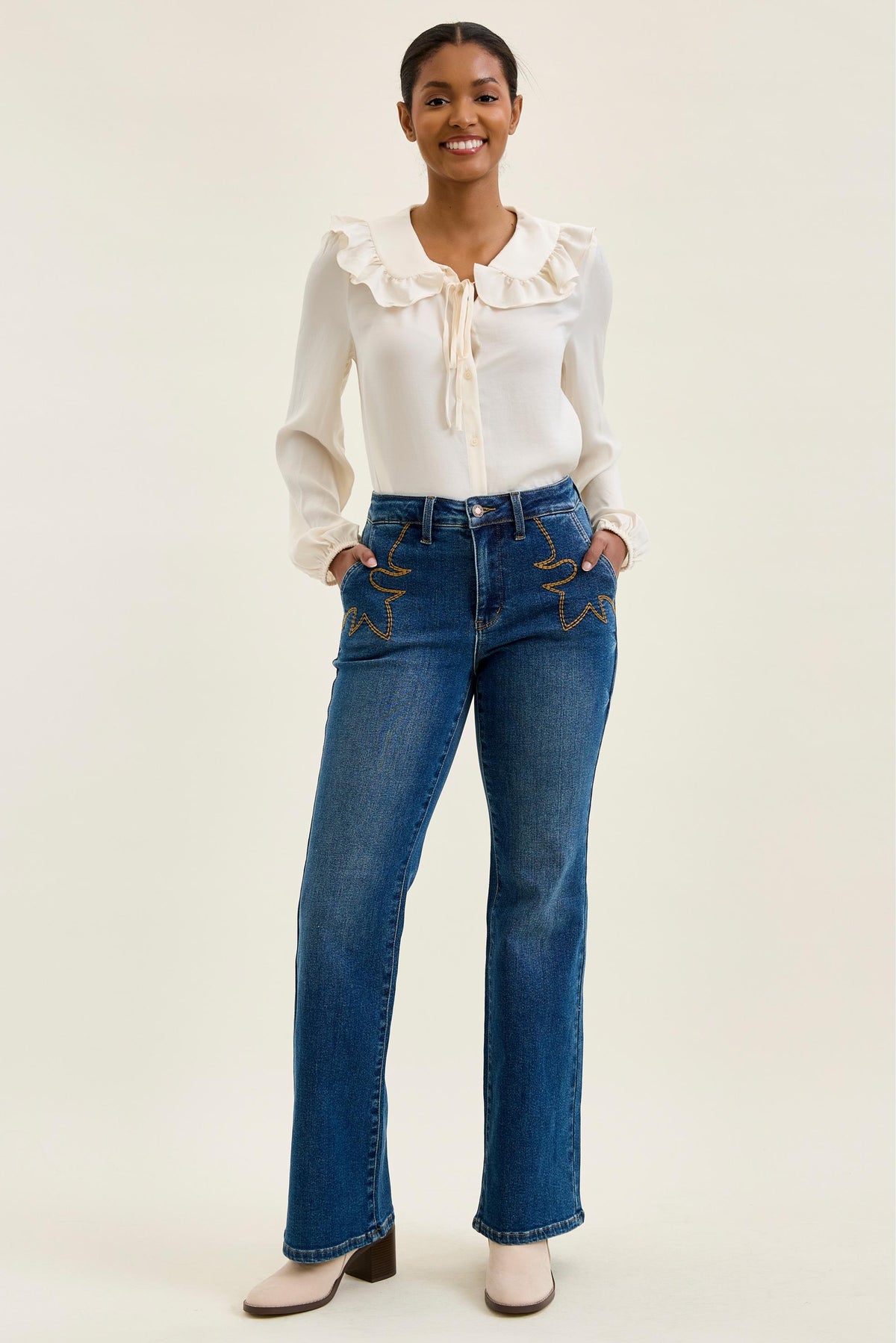 Judy Blue Daisy bootcut jean in Saddle Blue, full length front styling view