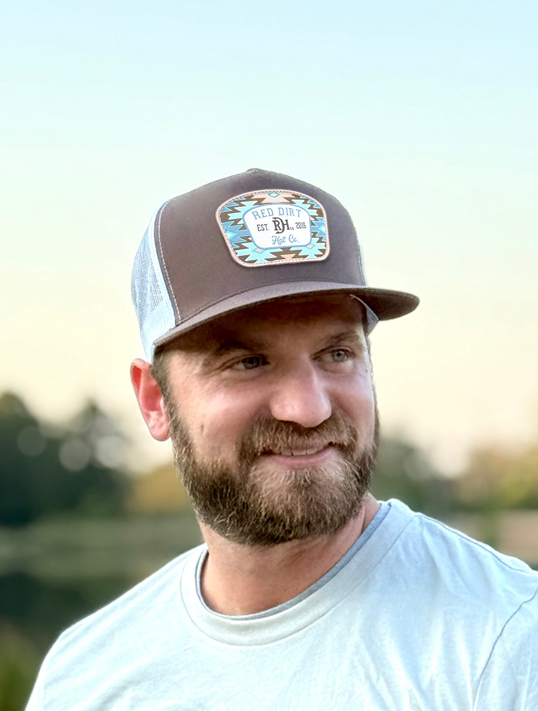 Red Dirt Hat Co. Aztec Jango cap in brown with white mesh back and Aztec patch