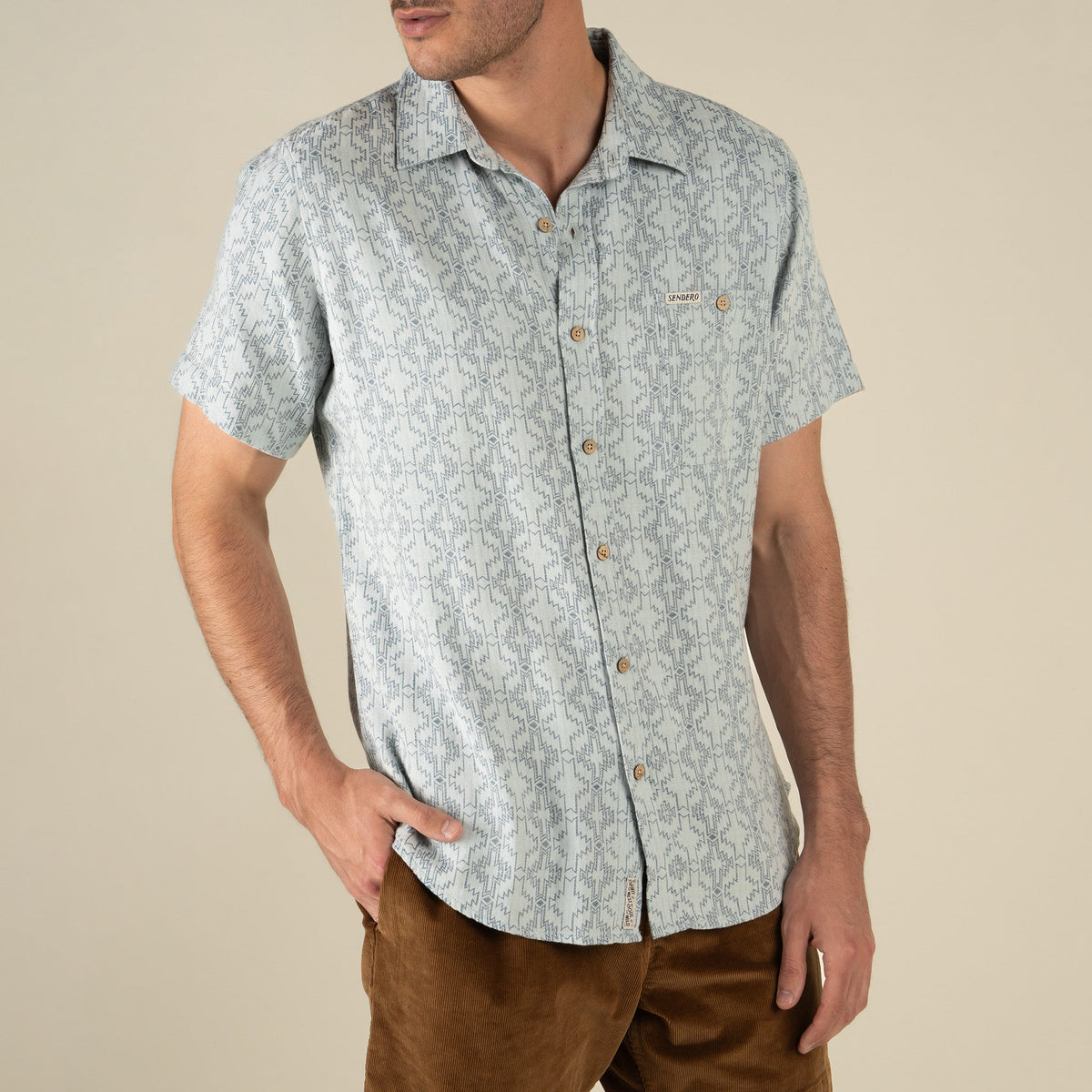Sendero Provisions Co. Men's City Slicker Button Up Short Sleeve Shirt - Arizola Chevron - Faded Blue - on model