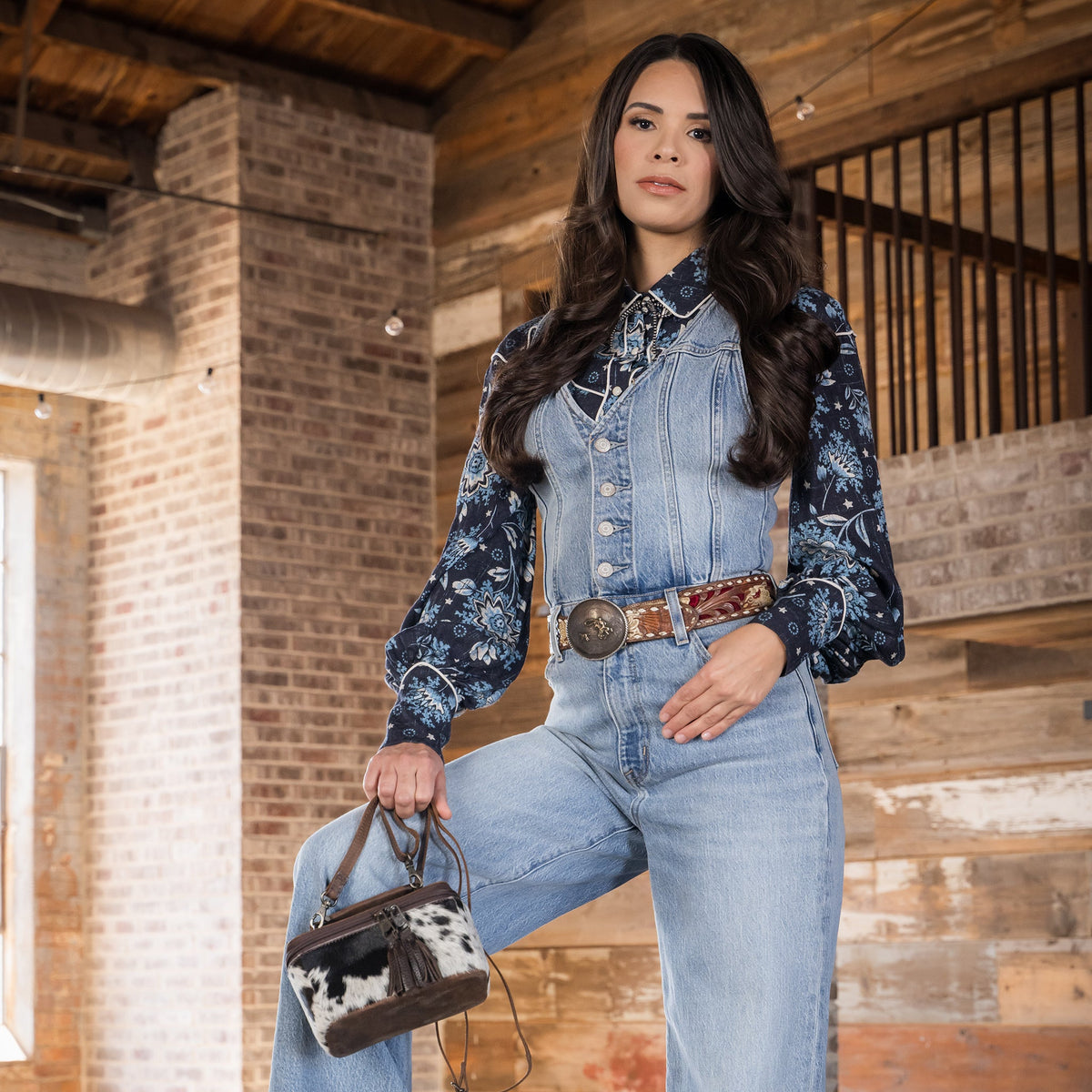 STS Ranchwear Women's Cowhide Petite Train Case Crossbody – lifestyle on model