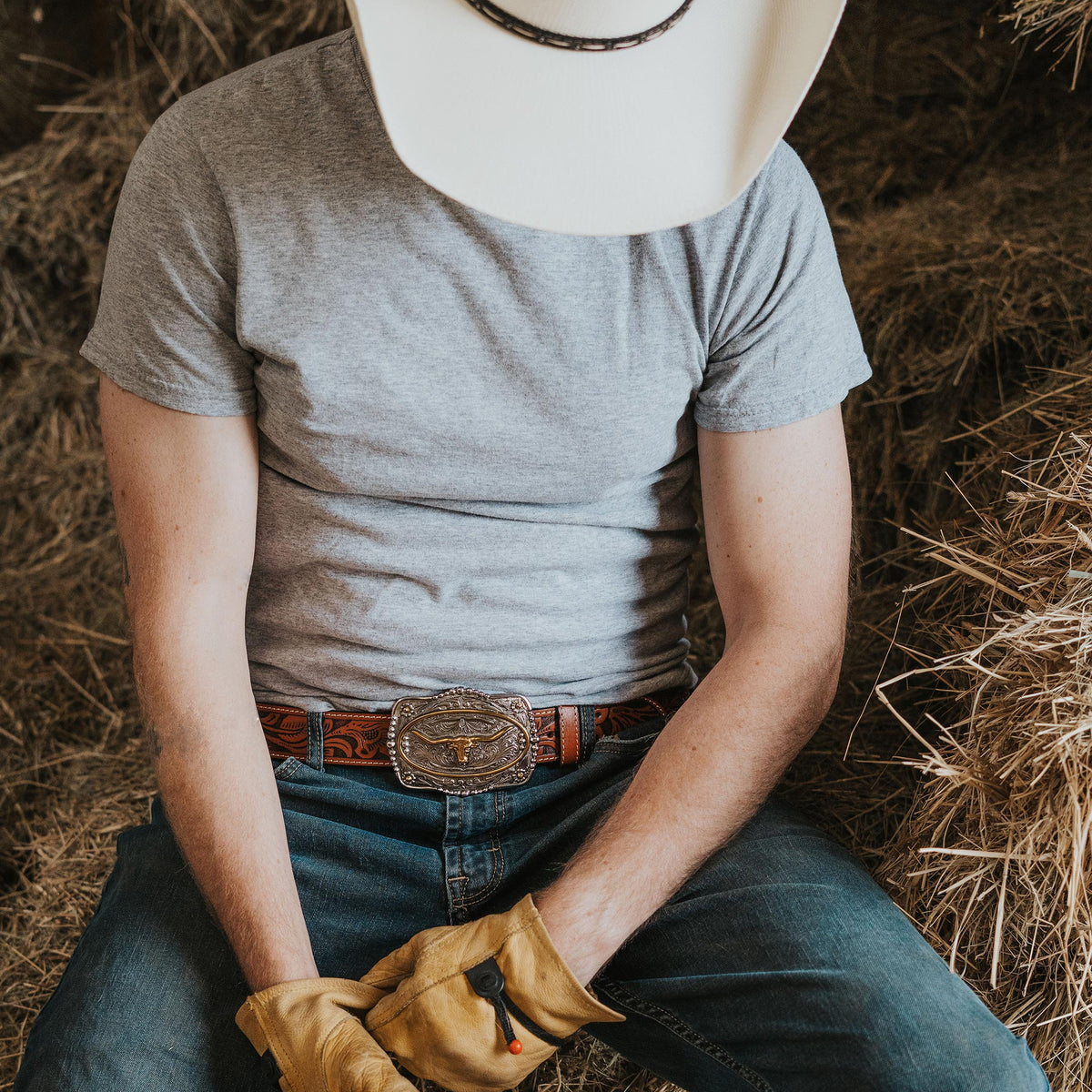 AndWest 1 1/2-inch tooled leather belt with longhorn buckle, Western-style belt with detailed tooling and metal buckle.