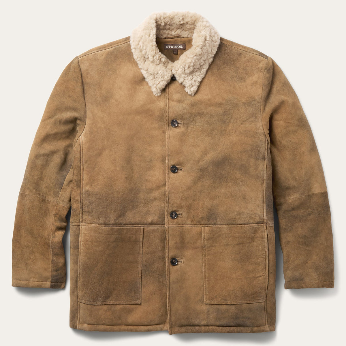Stetson women's antique suede shearling overcoat with plush lining, stylish and warm for cold weather.