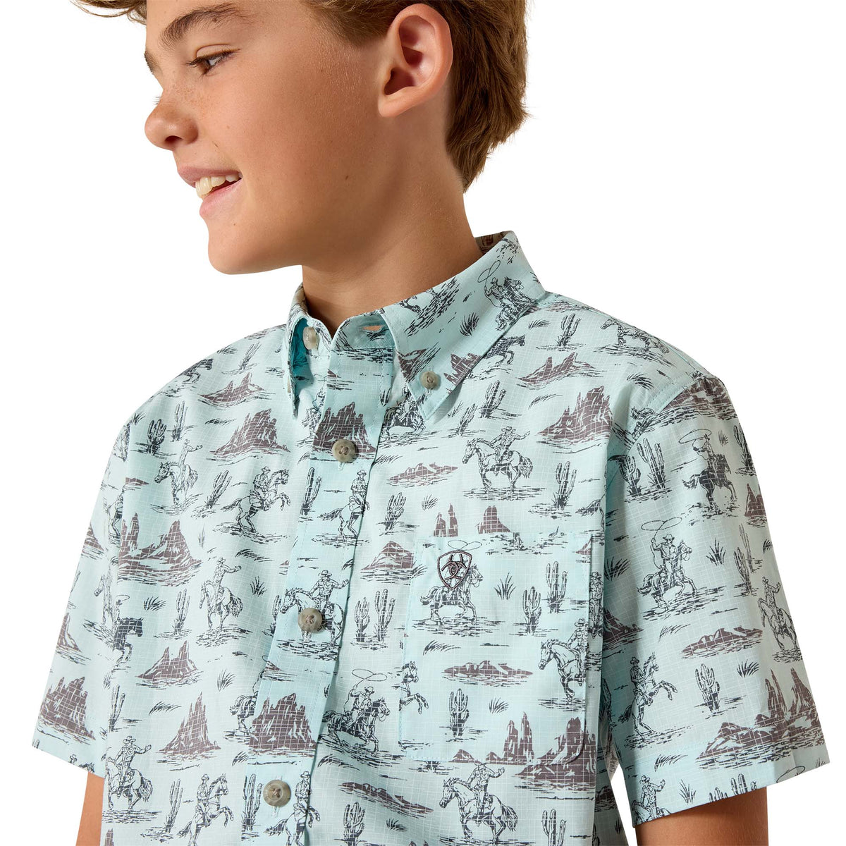 Ariat boys' casual Pratt shirt in Blue Glow, featuring a comfortable fit and stylish design, displayed on a hanger.