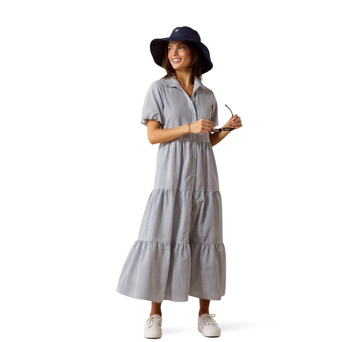 Ariat Countryside Women's Dovestone Dress shown on a hanger, featuring a casual, lightweight fabric with a relaxed fit and natural style.