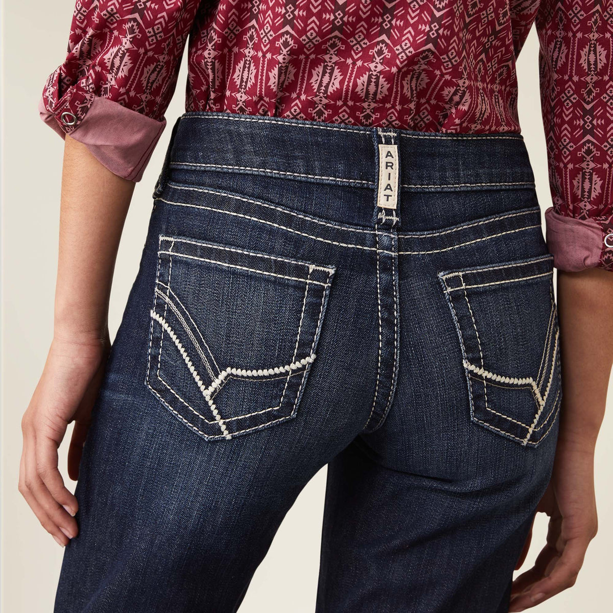 Ariat Girls R.E.A.L Brianna boot cut jeans in Naomi wash, denim with classic stitching and a comfortable fit for young girls.