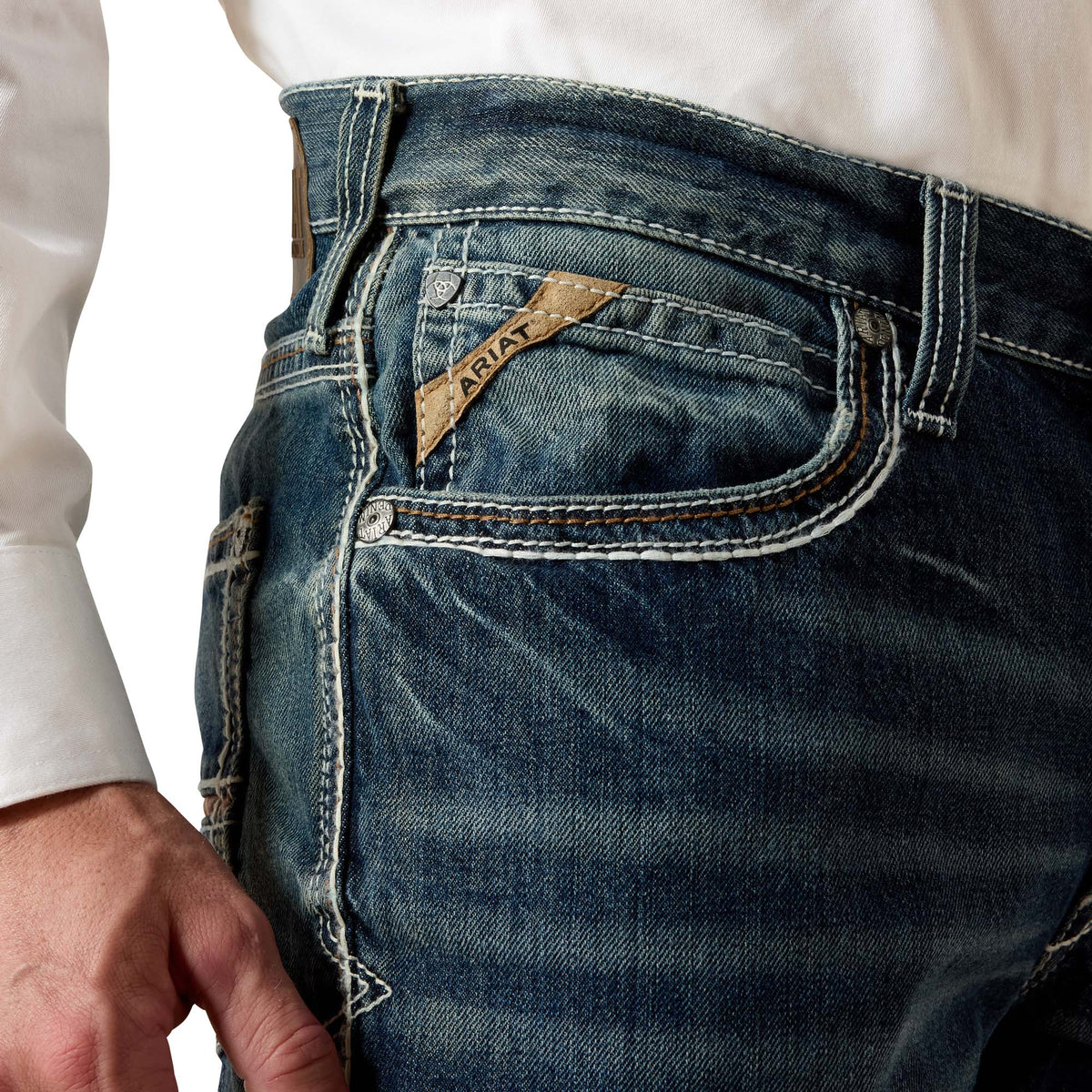 Ariat Men's M4 Coltrane Boot Cut Jeans in Durango color, made of durable denim with a classic boot cut fit.