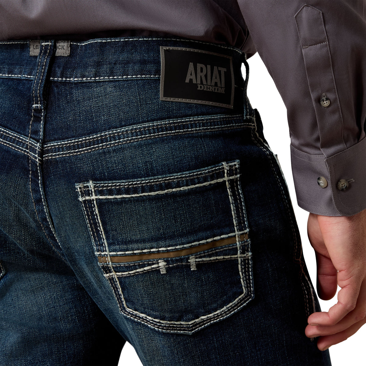 Ariat men's M5 Slim Stretch Coltrane Stackable straight leg jeans in Nightingale, showing the fit and dark denim fabric.