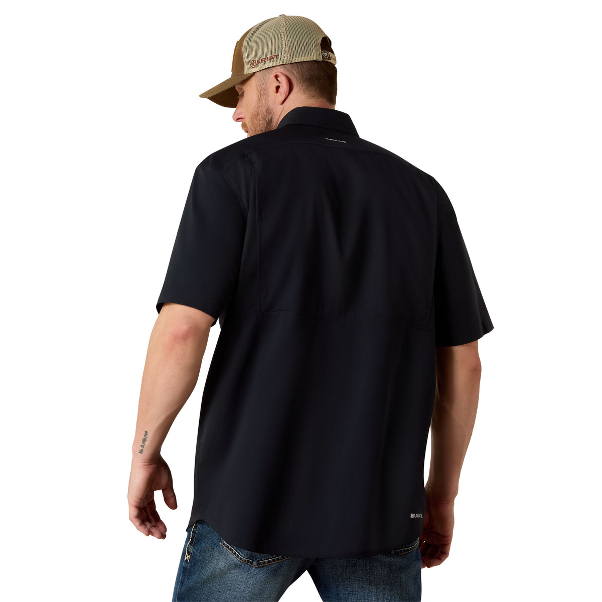 Black Ariat Men’s VentTEK Classic Fit Shirt displayed on a hanger, showcasing the casual button-up design and breathable fabric.