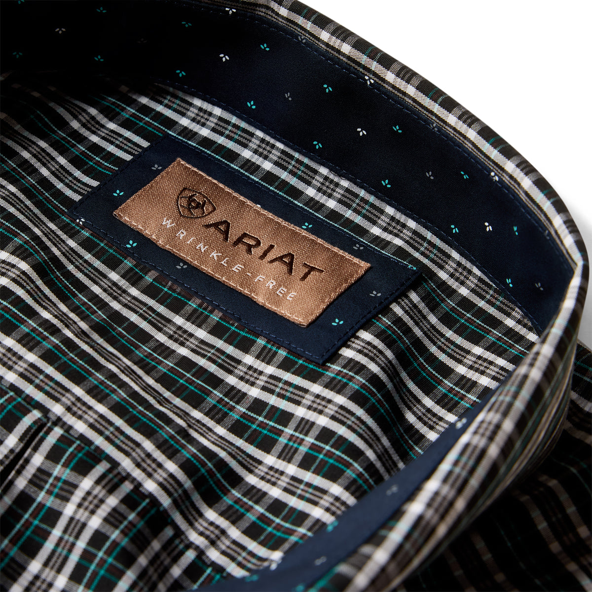 Ariat men's wrinkle-free Whitford classic fit shirt in black plaid, showing the tailored collar and button-down front.