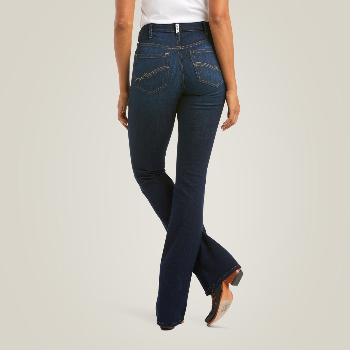Ariat R.E.A.L. high-rise Ballary boot cut jeans in Pennsylvania style, denim fabric, with classic five-pocket design and contrast stitching.