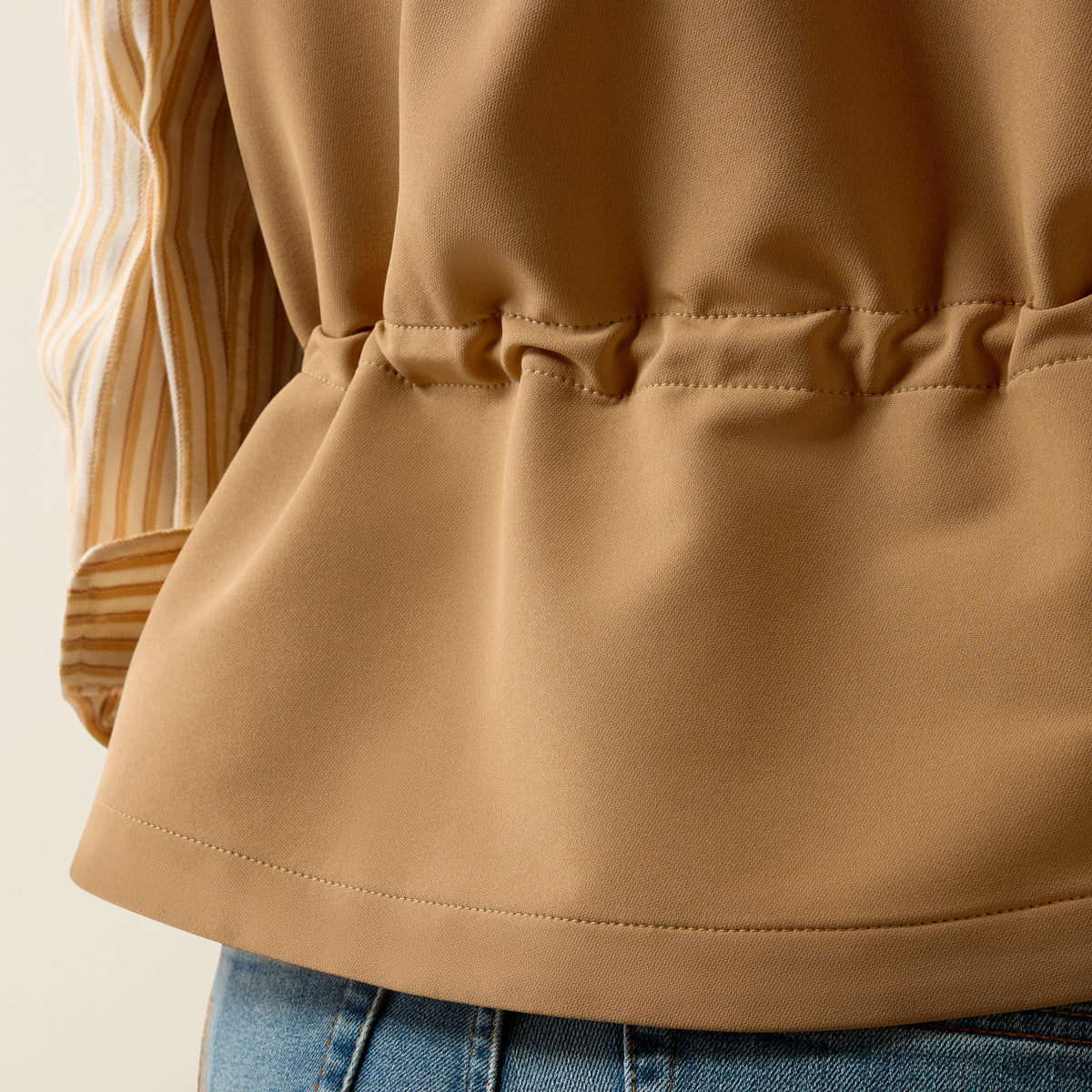 Ariat Women's Atlas Vest in Tiger's Eye color, lightweight outdoor vest with a front zipper and collar, designed for women.