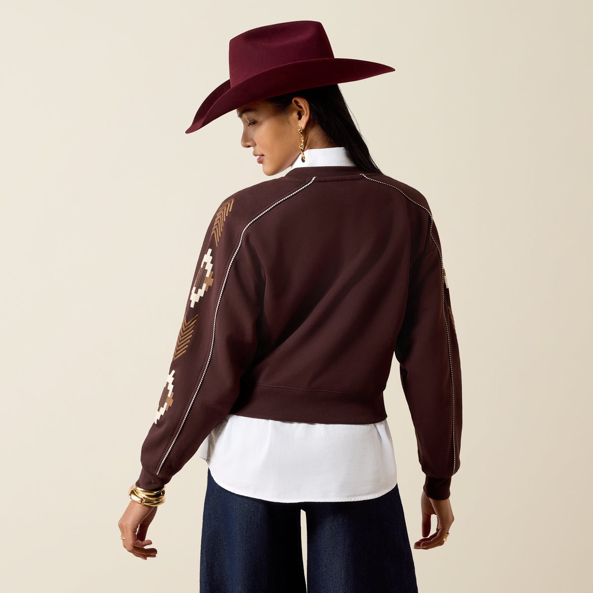 Ariat Women's Dakota Sweatshirt in Chocolate Plum, showing the cozy, long-sleeve sweatshirt with a relaxed fit and soft fabric.