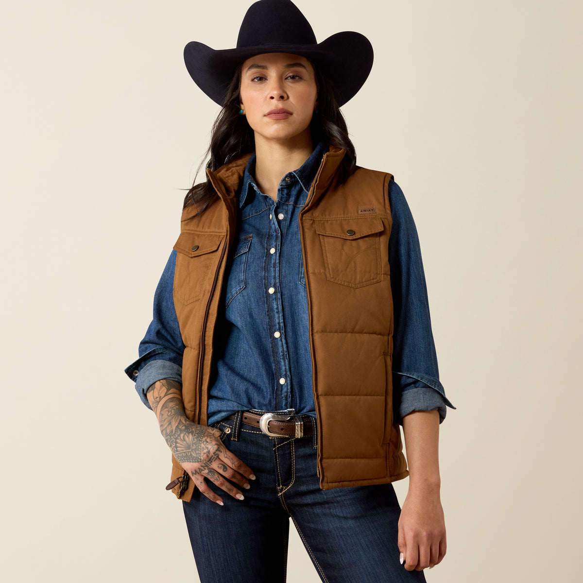 Ariat Women's Grizzly Quilted Vest featuring a dachshund design, warm quilted fabric, and a stylish, functional vest for women.