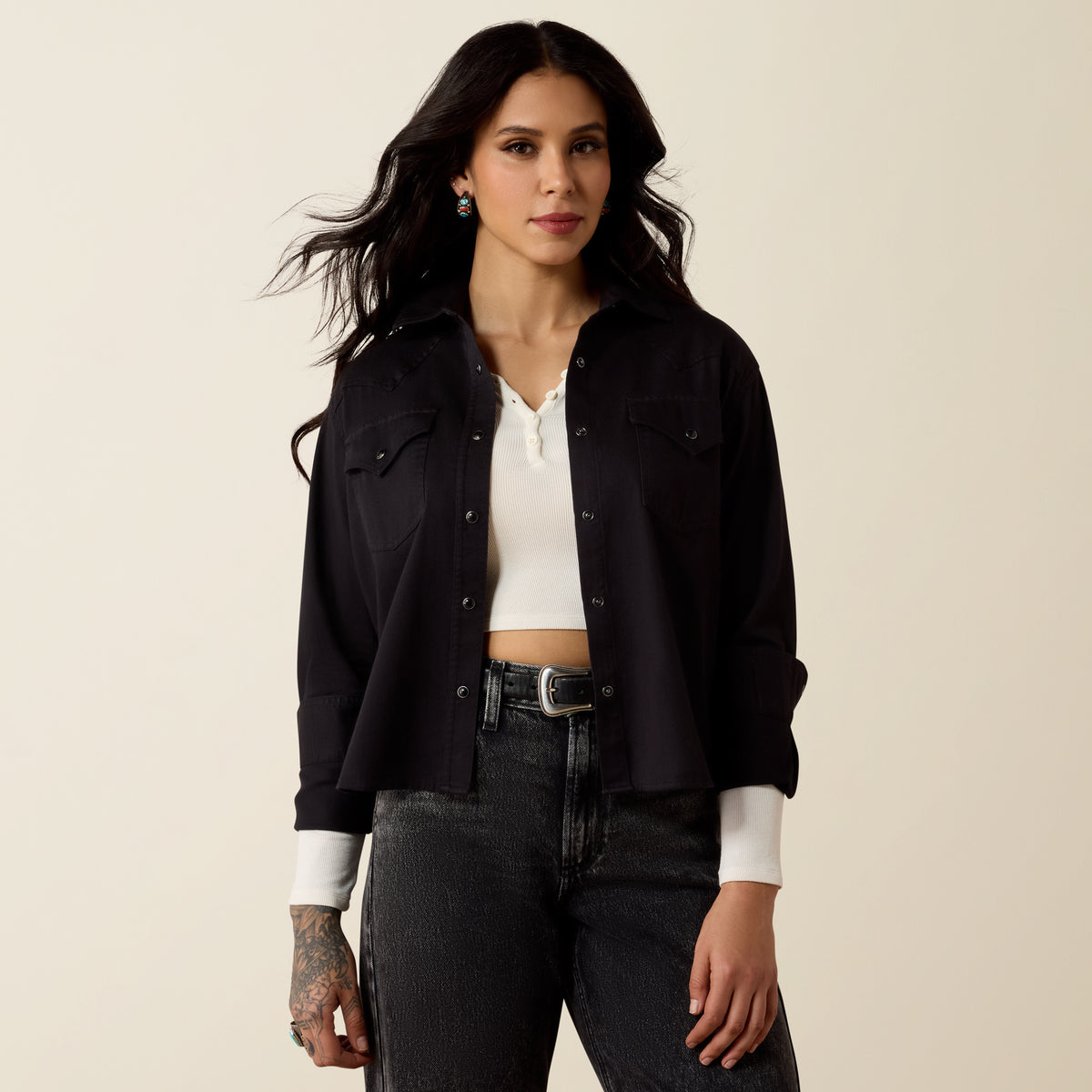 Ariat Women's Black Western Snap Shirt with a classic collar and snap buttons, tailored fit, and Western-inspired style.