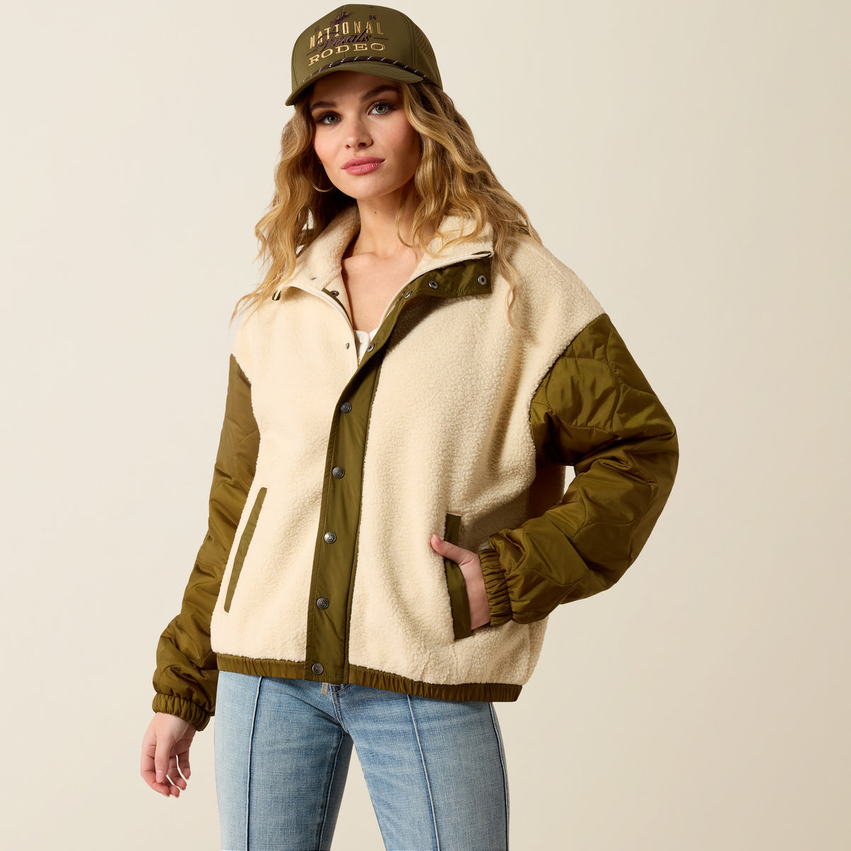 Ariat Women's Sherpa Blocked Jacket in Parchment and Moss Green, stylish winter jacket with cozy Sherpa lining and color blocking design.