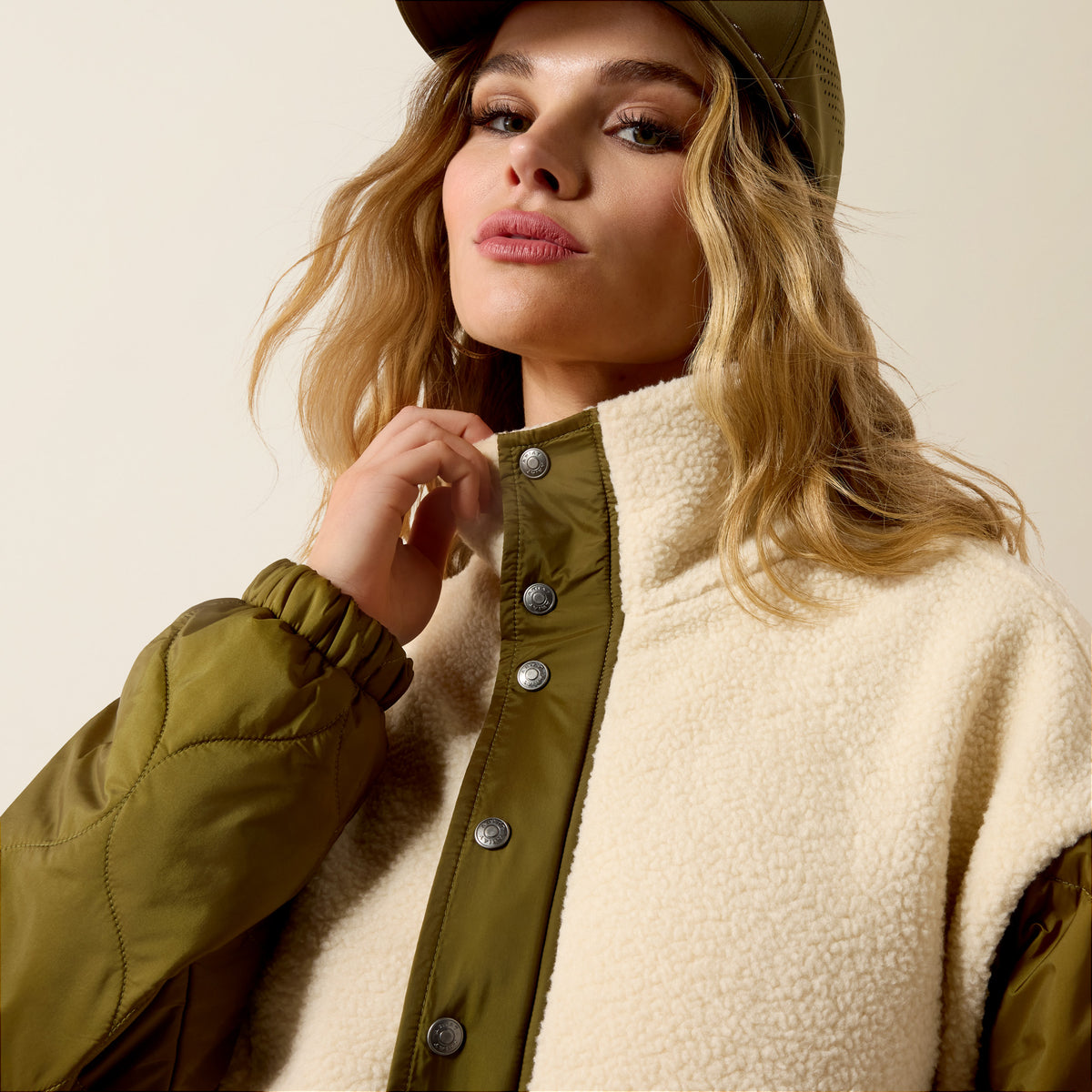 Ariat Women's Sherpa Blocked Jacket in Parchmen and Moss Green, featuring cozy sherpa lining and color-blocked design.