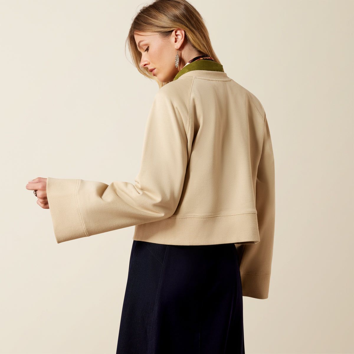 Ariat Women's Sydney Sweatshirt in Irish Cream, soft knit fabric, casual fit, featuring a round neckline and long sleeves.
