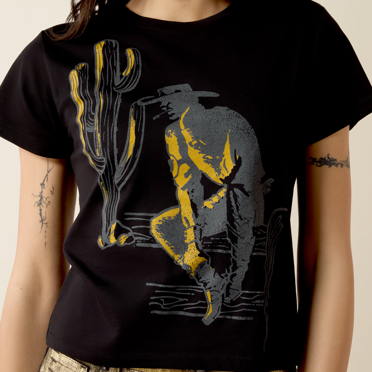 Black Ariat Women's Wild West short sleeve T-shirt with Western-inspired design and comfortable fit.