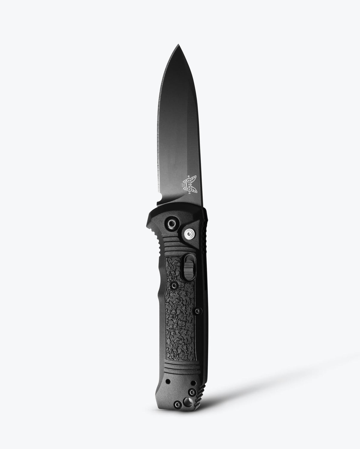 Benchmade Casbah knife with black Grivory handle and stainless steel blade, featuring a sleek, tactical design.