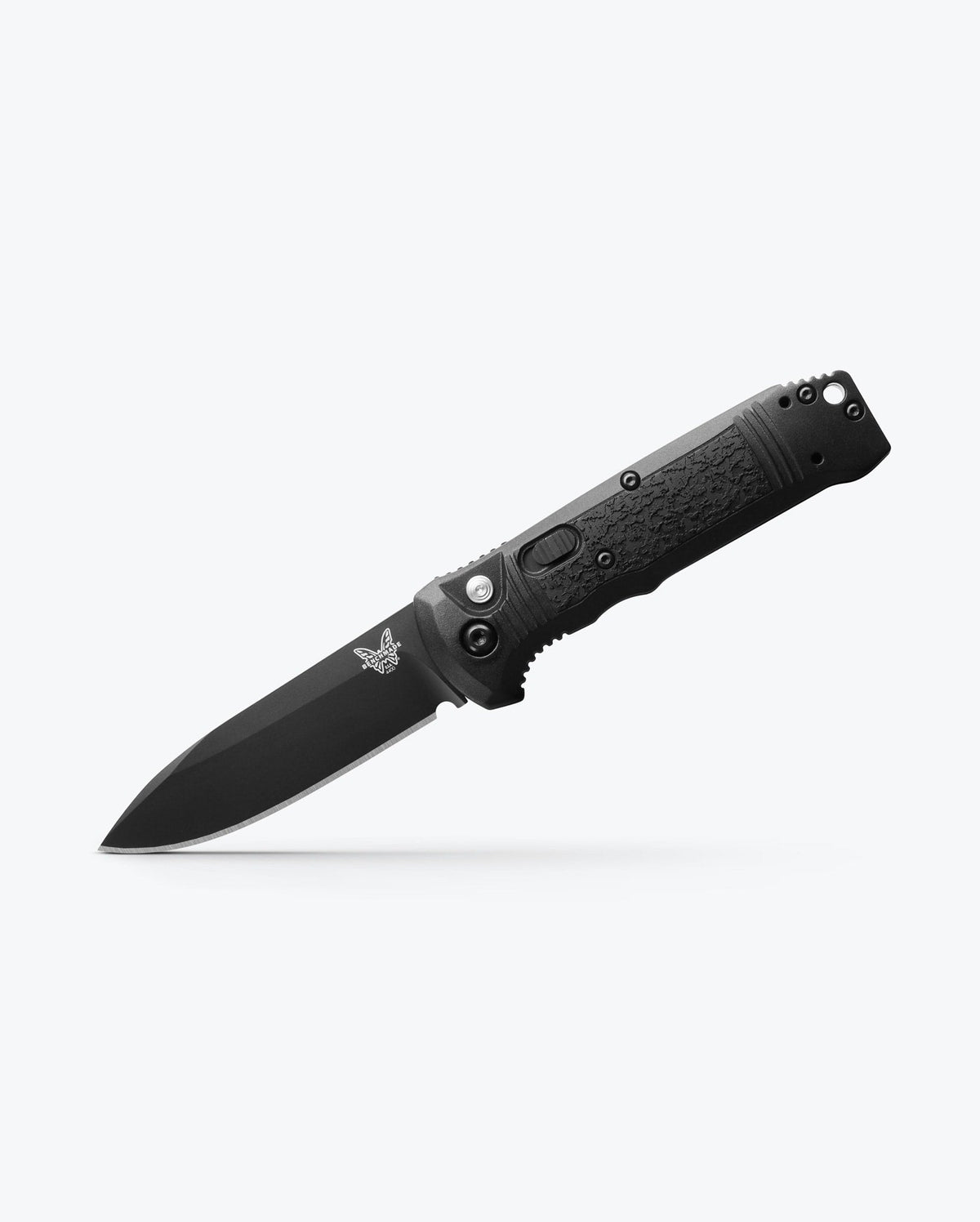 Benchmade Casbah knife with black Grivory handle and partially serrated blade, showcasing its tactical and durable design.