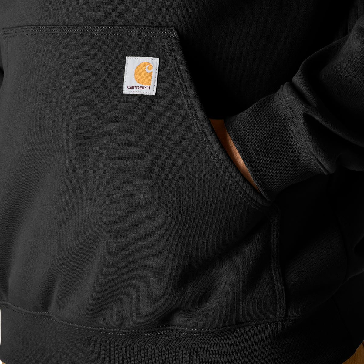 Black Carhartt men's Iconic K288 logo sweatshirt with front logo design and ribbed cuffs, made from comfortable cotton fabric.