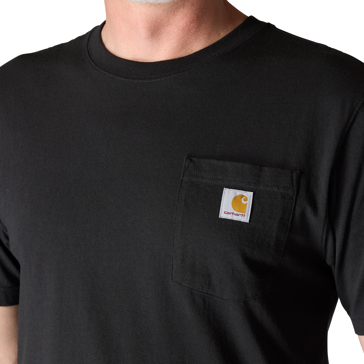 Black Carhartt men's K87 pocket T-shirt with classic crew neck and chest pocket, made from durable cotton fabric.