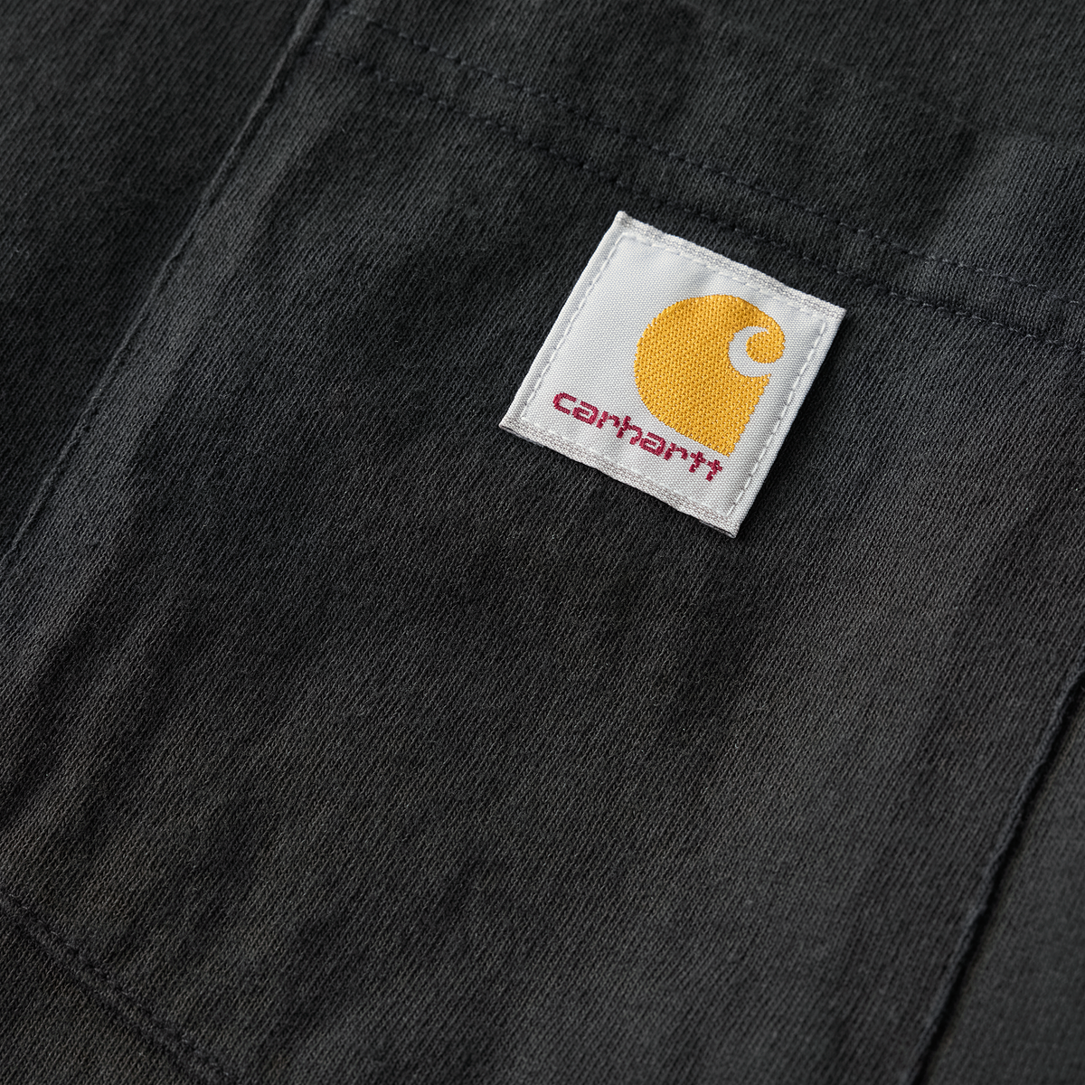 Black Carhartt men's Iconic K87 pocket T-shirt with chest pocket, made of comfortable cotton fabric.