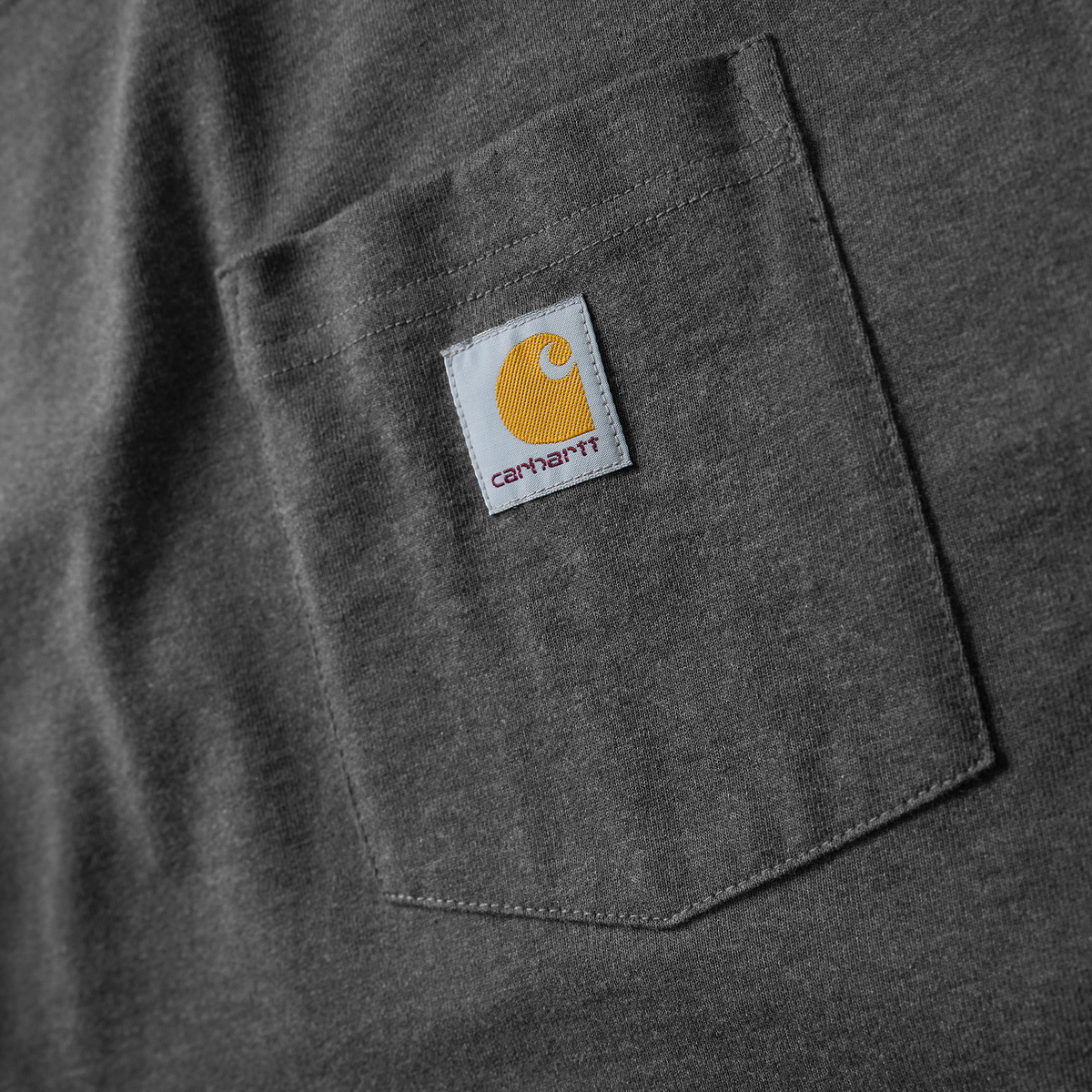 Carhartt Men's Iconic K87 Pocket T-Shirt in Carbon Heather, casual cotton T-shirt with front chest pocket and classic fit.