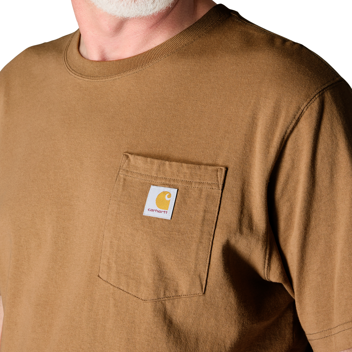 Carhartt Men's Brown K87 Pocket T-Shirt with classic crew neck and chest pocket, durable cotton fabric, and Carhartt branding.