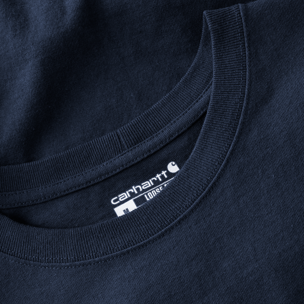 Navy Carhartt men's Iconic K87 pocket T-shirt with front chest pocket, made of soft cotton fabric, casual and comfortable fit.