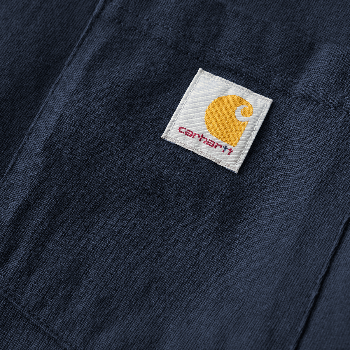 Navy Carhartt men's K87 pocket T-shirt with chest pocket, made of soft cotton fabric, featuring the Carhartt logo on the pocket.