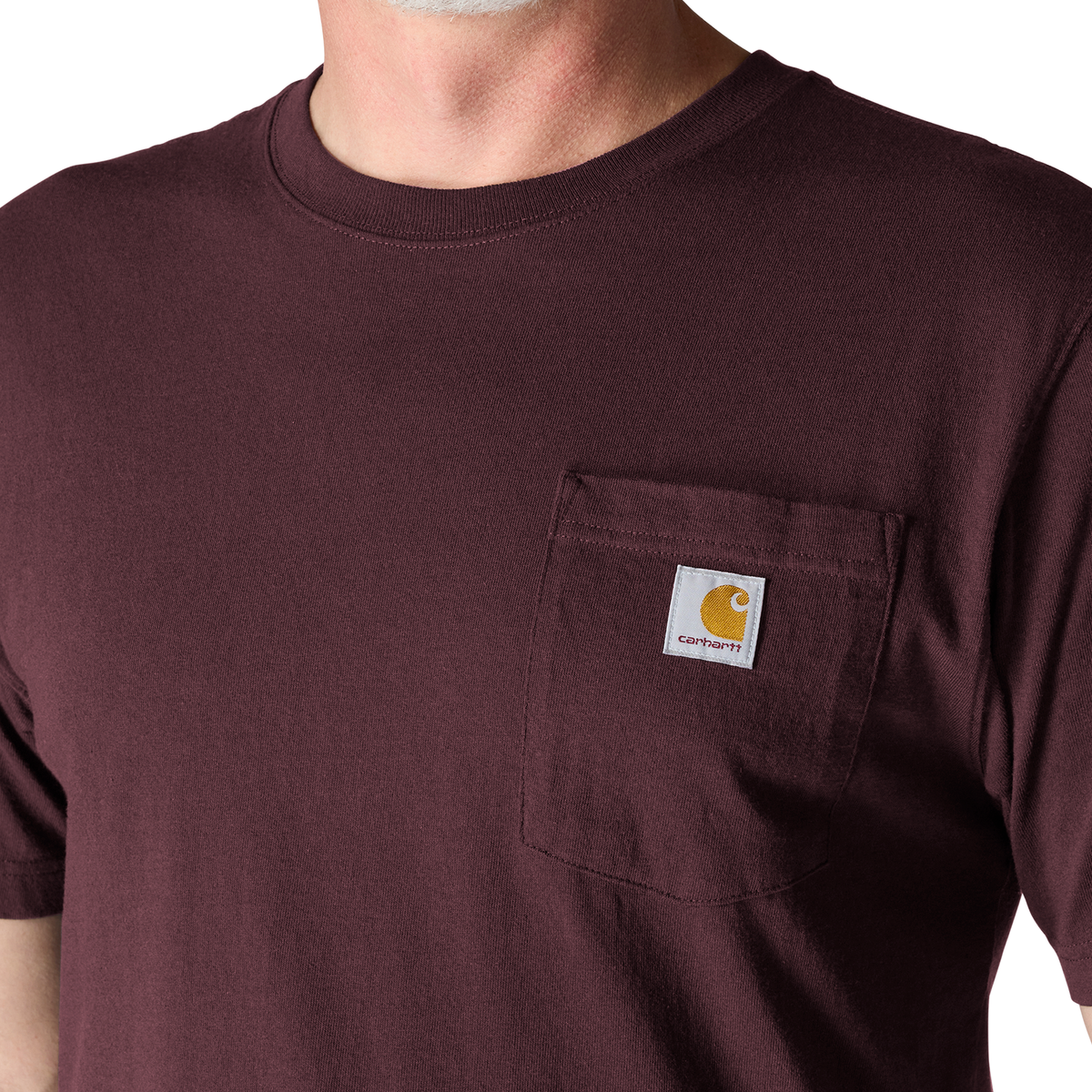 Carhartt Men's Iconic K87 Pocket T-Shirt in port color, featuring a classic crew neck and chest pocket, made from soft cotton.