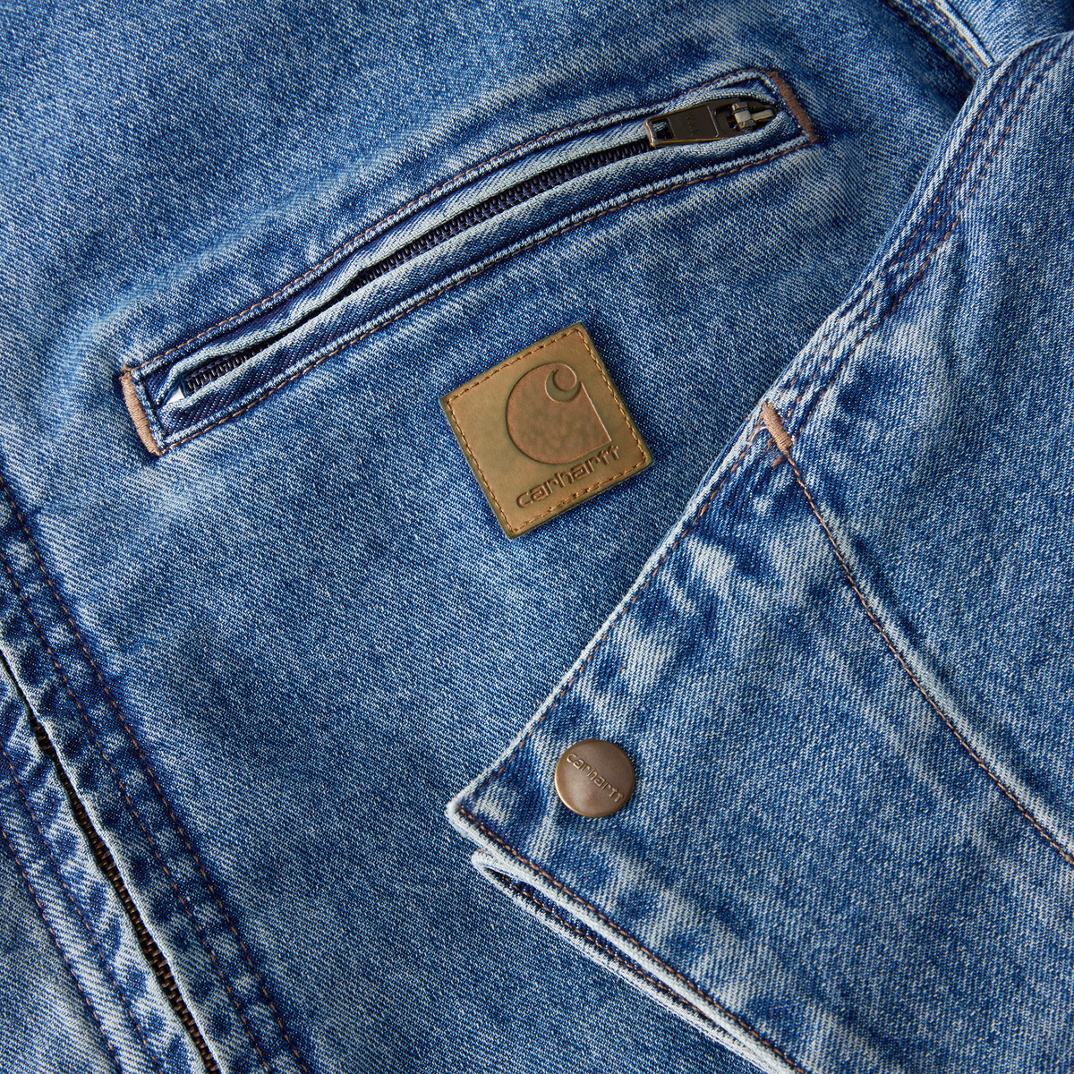 Carhartt men's Muskegon overcoat with relaxed fit and durable denim material, suitable for cold weather and outdoor wear.
