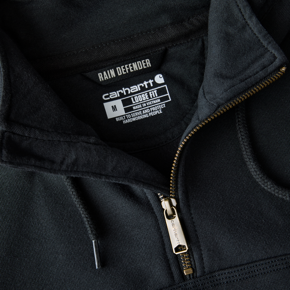 Carhartt Men's Paxton 1/4-Zip Sweatshirt in black, featuring a quarter-zip collar and soft fabric for casual wear.