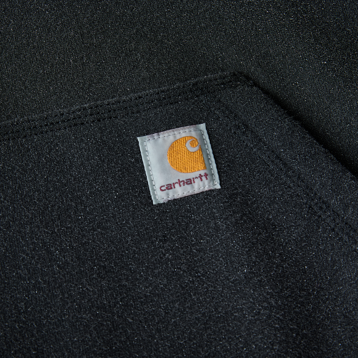 Black Carhartt men's Paxton 1/4-zip sweatshirt, casual fleece with ribbed cuffs and collar, displayed on a plain background.