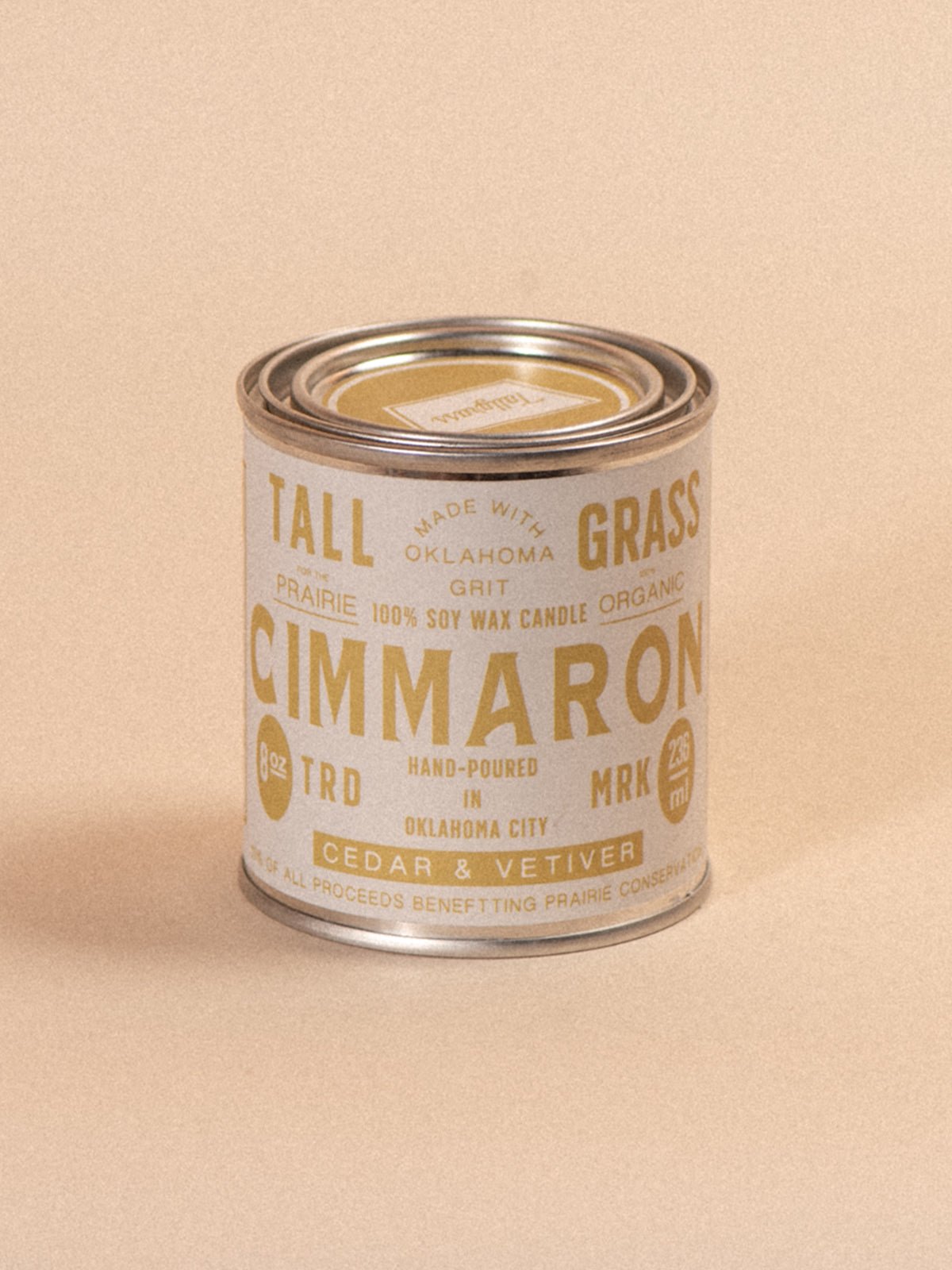 Tallgrass Supply Cimmaron soy wax candle with cedar and vetiver scent, featuring a tall, elegant candle design.