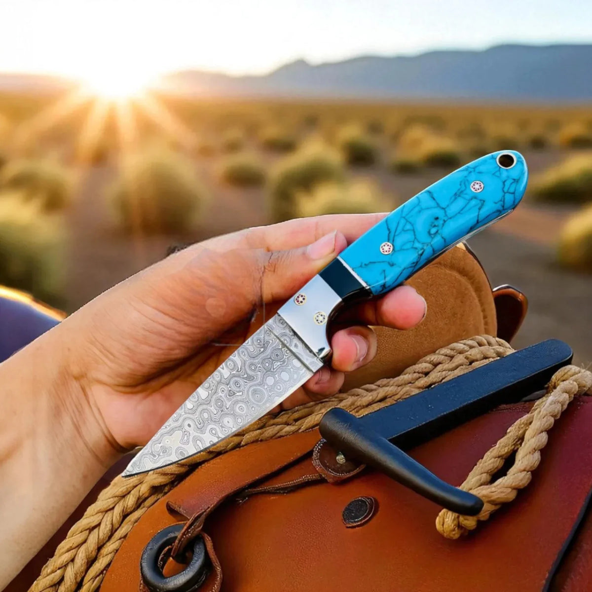 Malika Knives cowboy hunting knife with Damascus steel blade and marble handle, ideal for outdoor and hunting use